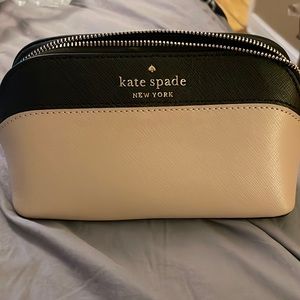 Like new Kate Spade small cosmetic case.
